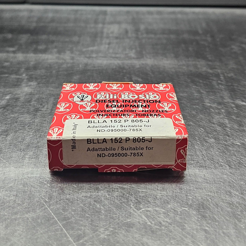 Small red and white box on a textured gray surface