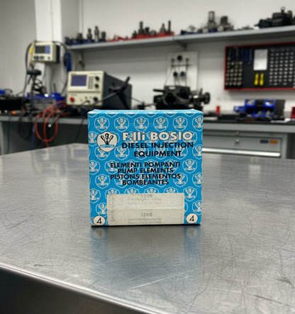 Fellibbosio diesel injection equipment packaging on a gray surface